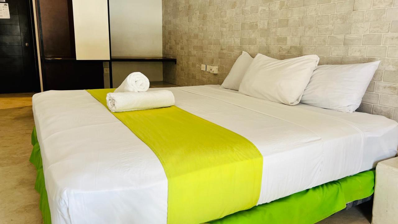 Hotel Mayari Holbox Eksteriør billede A bed runner