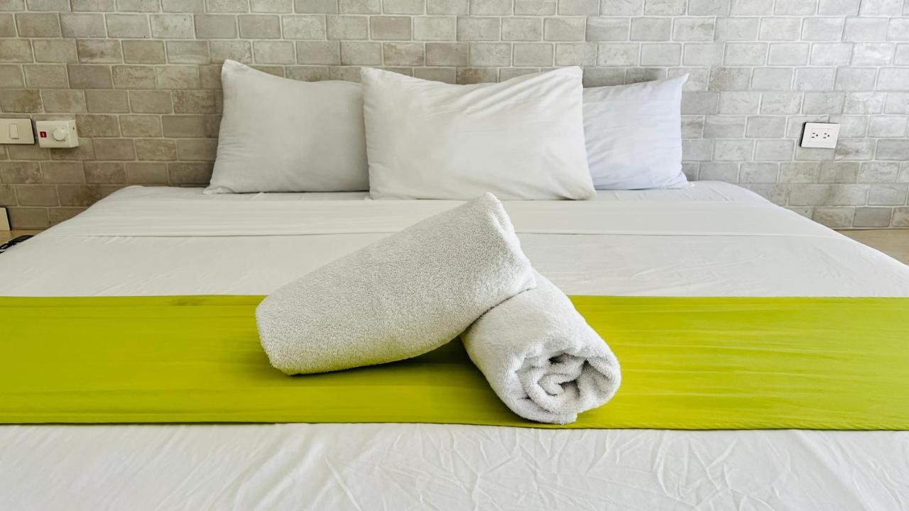 Hotel Mayari Holbox Eksteriør billede Bath towels on a bed